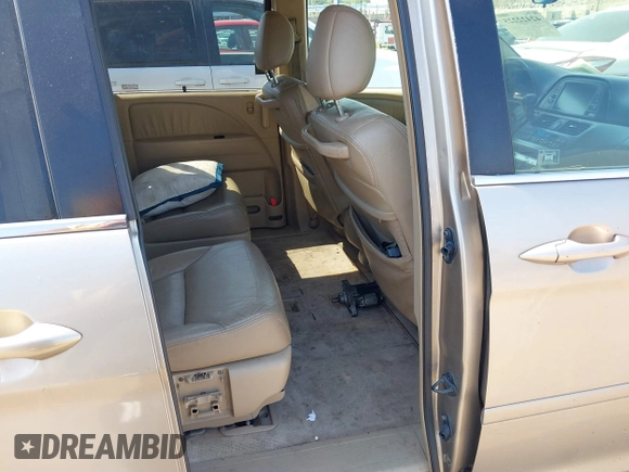 2005 Honda Odyssey EX-L with VIN 5FNRL38755B107829, listed as a IAAI auction lot 42422225 with 227,008 mi miles and . Bid and sale history available at DreamBid. Image 8.