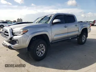2016 Toyota Tacoma SR with VIN 5TFCZ5AN6GX045388, listed as a Copart auction lot 64215105 with 56,275 mi miles and Salvage title. Bid and sale history available at DreamBid. Image 1.