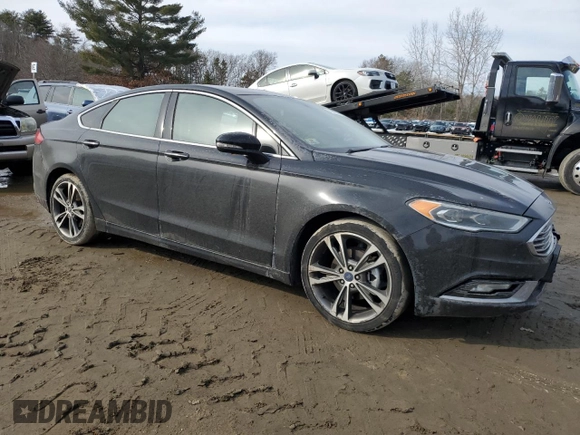 2017 Ford Fusion Titanium with VIN 3FA6P0D94HR183550, listed as a Copart auction lot 46148595 with 140,505 mi miles and Salvage title. Bid and sale history available at DreamBid. Image 4.