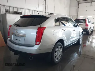 2013 Cadillac SRX Luxury Collection with VIN 3GYFNCE3XDS652987, listed as a IAAI auction lot 40955236 with 119,517 mi miles. Bid and sale history available at carsss.com. Image 4.