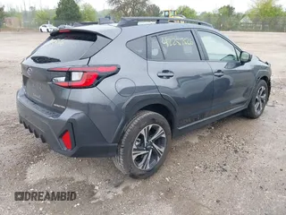 2024 Subaru Crosstrek Premium z VIN JF2GUADC0RH332534, wystawiony jako IAAI lot #42257526 z przebiegiem 14 944 mil mil oraz . Historia ofert i sprzedaży dostępna na DreamBid. Obrazek 4.