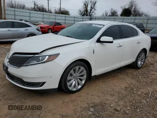 2015 Lincoln MKS with VIN 1LNHL9DK3FG600792, listed as a Copart auction lot 86631074 with 104,079 mi miles and Salvage Title. Bid and sale history available at carsss.com. Image 1.