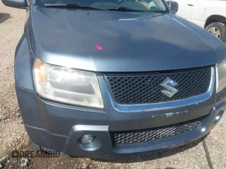 2006 Suzuki Grand Vitara Luxury with VIN JS3TE947864101994, listed as a IAAI auction lot 42755764 with 110,890 mi miles and . Bid and sale history available at DreamBid. Image 6.