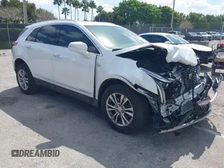 2020 Cadillac XT5 Premium Luxury FWD with VIN 1GYKNCRS7LZ129119, listed as a IAAI auction lot 41710878 with 52,575 mi miles. Bid and sale history available at carsss.com. Image 1.