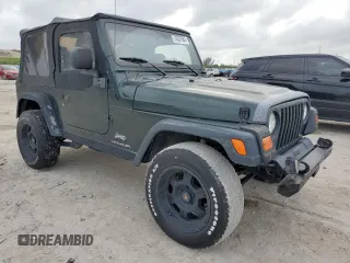 2003 Jeep Wrangler SE with VIN 1J4FA29103P313229, listed as a Copart auction lot 79337984 with 135,668 mi miles and Salvage title. Bid and sale history available at DreamBid. Image 4.