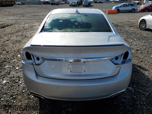 2014 Chevrolet Impala LTZ with VIN 2G1155S36E9101768, listed as a Copart auction lot 46809825 with 158,063 mi miles and Salvage Title. Bid and sale history available at DreamBid. Image 6.