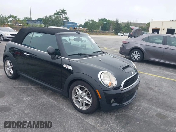 2010 MINI Convertible S z VIN WMWMS3C52ATY08772, wystawiony jako IAAI lot #41845412 z przebiegiem 71 215 mil mil oraz . Historia ofert i sprzedaży dostępna na DreamBid. Obrazek 1.