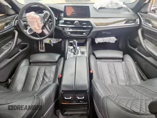 2018 BMW 5 Series 540i xDrive with VIN WBAJE7C52JWD52730, listed as a Copart auction lot 60297425 with 104,208 mi miles and Salvage title. Bid and sale history available at DreamBid. Image 8.
