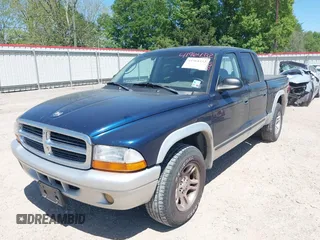 2003 Dodge Dakota SLT with VIN 1D7HL48N63S158682, listed as a IAAI auction lot 41964332 with 278,390 mi miles. Bid and sale history available at carsss.com. Image 6.