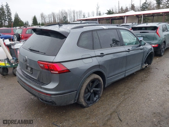 2023 Volkswagen Tiguan SE R-Line Black with VIN 3VVCB7AX0PM132194, listed as a IAAI auction lot 41594049 with 15,080 mi miles. Bid and sale history available at carsss.com. Image 4.