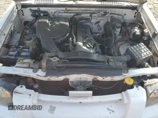 2004 Nissan Frontier XE z VIN 1N6DD26T24C456599, wystawiony jako Copart lot #55990875 z przebiegiem 197 906 mil mil oraz Szkoda całkowita • Salvage title. Historia ofert i sprzedaży dostępna na DreamBid. Obrazek 11.