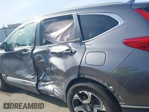 2018 Honda CR-V Touring with VIN 7FARW1H93JE027294, listed as a IAAI auction lot 41903484 with 80,999 mi miles and . Bid and sale history available at DreamBid. Image 19.