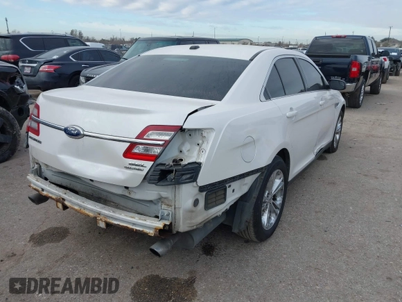 2013 Ford Taurus SEL with VIN 1FAHP2E87DG111530, listed as a IAAI auction lot 41322957 with 183,103 mi miles. Bid and sale history available at carsss.com. Image 4.