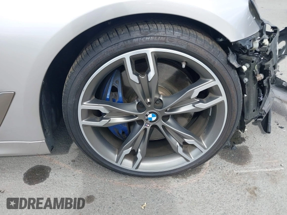 2020 BMW 5 Series M550i xDrive z VIN WBAJS7C07LCD85532, wystawiony jako IAAI lot #41518071 z przebiegiem 57 645 mil mil oraz . Historia ofert i sprzedaży dostępna na DreamBid. Obrazek 19.