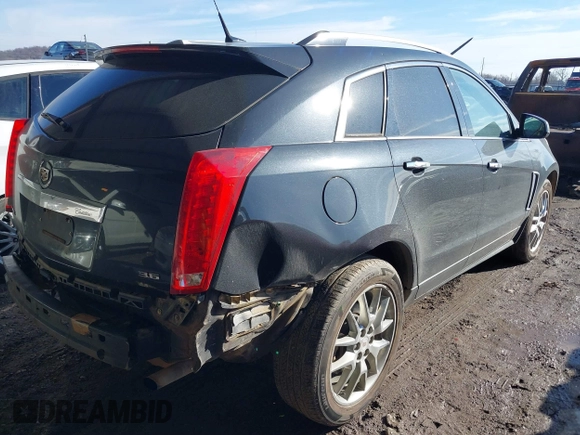 2014 Cadillac SRX Premium Collection z VIN 3GYFNDE34ES581728, wystawiony jako IAAI lot #41578226 z przebiegiem 121 118 mil mil oraz . Historia ofert i sprzedaży dostępna na DreamBid. Obrazek 4.