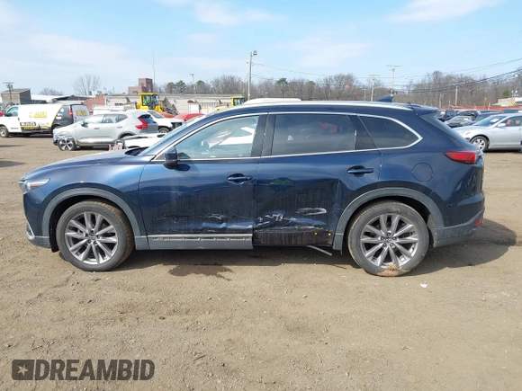 2021 Mazda CX-9 Grand Touring with VIN JM3TCBDY7M0540359, listed as a IAAI auction lot 41711366 with 47,391 mi miles and . Bid and sale history available at carsss.com. Image 14.