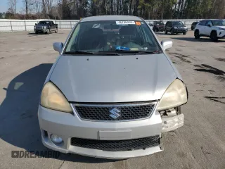 2005 Suzuki Aerio SX z VIN JS2RC61H755303931, wystawiony jako Copart lot #46796435 z przebiegiem 91 524 mil mil oraz Szkoda całkowita • Salvage title. Historia ofert i sprzedaży dostępna na DreamBid. Obrazek 5.