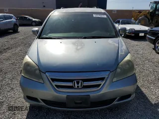 2005 Honda Odyssey EX with VIN 5FNRL38405B099581, listed as a Copart auction lot 52970815 with 218,225 mi miles and Salvage Title. Bid and sale history available at carsss.com. Image 5.