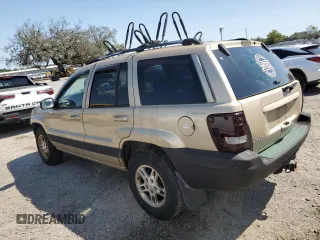 1999 Jeep Grand Cherokee Limited with VIN 1J4GW68N7XC581404, listed as a Copart auction lot 51533715 with 27,190 mi miles and Salvage Title. Bid and sale history available at carsss.com. Image 2.