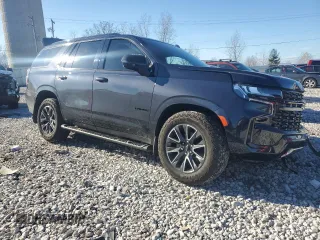 2023 Chevrolet Tahoe Z71 z VIN 1GNSKPKD8PR336200, wystawiony jako Copart lot #79418844 z przebiegiem Nie podano mil oraz Szkoda całkowita • Salvage title. Historia ofert i sprzedaży dostępna na DreamBid. Obrazek 4.