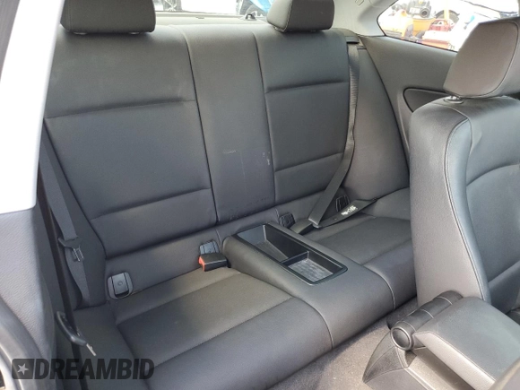 2012 BMW 1 Series 128i with VIN WBAUP7C56CVP23806, listed as a Copart auction lot 62339235 with 105,776 mi miles and Salvage title. Bid and sale history available at DreamBid. Image 10.