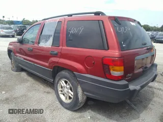2004 Jeep Grand Cherokee Laredo with VIN 1J4GW48SX4C160475, listed as a IAAI auction lot 36500183 with 189,047 mi miles and . Bid and sale history available at DreamBid. Image 3.