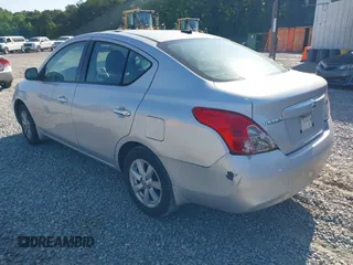 2012 Nissan Versa SV with VIN 3N1CN7APXCL867337, listed as a IAAI auction lot 42079349 with 260,442 mi miles. Bid and sale history available at carsss.com. Image 3.
