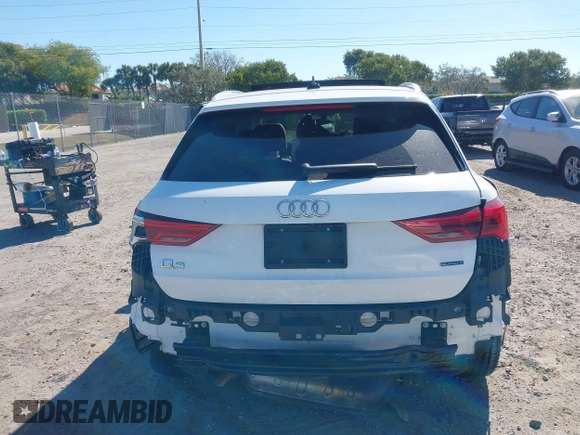 2021 Audi Q3 Premium with VIN WA1AUCF32M1097059, listed as a IAAI auction lot 41825132 with 66,144 mi miles and . Bid and sale history available at DreamBid. Image 16.