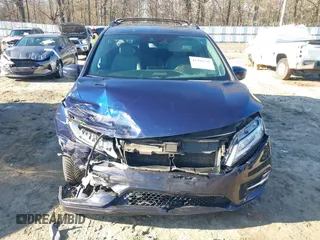 2020 Honda Odyssey Touring with VIN 5FNRL6H89LB015744, listed as a IAAI auction lot 41495735 with 106,440 mi miles and . Bid and sale history available at DreamBid. Image 6.