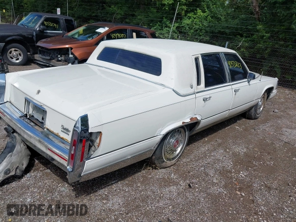 1991 Cadillac Brougham z VIN 1G6DW54E5MR723477, wystawiony jako IAAI lot #42535123 z przebiegiem 300 768 mil mil oraz . Historia ofert i sprzedaży dostępna na DreamBid. Obrazek 4.