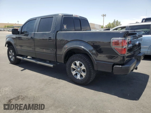 2014 Ford F-150 XL with VIN 1FTFW1CF1EKG32922, listed as a Copart auction lot 61793425 with 142,303 mi miles and Salvage title. Bid and sale history available at DreamBid. Image 2.