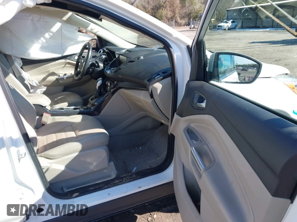 2014 Ford Escape Titanium with VIN 1FMCU9JX7EUD17335, listed as a IAAI auction lot 41302107 with 104,352 mi miles and . Bid and sale history available at DreamBid. Image 5.