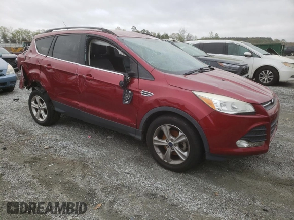 2014 Ford Escape SE with VIN 1FMCU0GXXEUD05991, listed as a Copart auction lot 51440465 with 129,445 mi miles and Salvage Title. Bid and sale history available at carsss.com. Image 4.