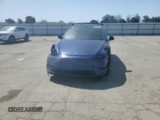 2023 Tesla Model Y Long Range with VIN 7SAYGAEE8PF927092, listed as a Copart auction lot 53917185 with 17,639 mi miles and Salvage Title. Bid and sale history available at DreamBid. Image 13.