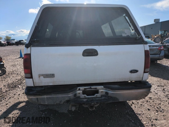 2002 Ford F-250 XL с VIN 1FTNX21F12EA84786, выставлен на аукционе Copart как лот 54698515 с пробегом 290 820 миль миль и Списание • Salvage title. История ставок и продаж доступна на DreamBid. Изображение 6.