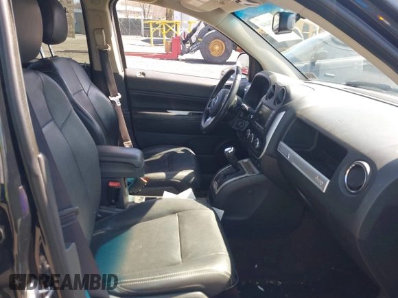 2014 Jeep Compass Limited with VIN 1C4NJDCBXED706173, listed as a IAAI auction lot 41784040 with 144,368 mi miles. Bid and sale history available at carsss.com. Image 5.