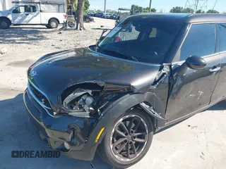 2015 MINI Countryman S with VIN WMWZC3C58FWT04316, listed as a IAAI auction lot 42525698 with 97,046 mi miles and . Bid and sale history available at DreamBid. Image 6.