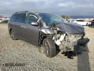 2020 Toyota Sienna SE with VIN 5TDXZ3DC0LS062302, listed as a Copart auction lot 46988815 with 97,304 mi miles and Salvage Title. Bid and sale history available at DreamBid. Image 4.