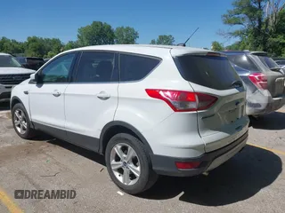 2016 Ford Escape SE z VIN 1FMCU9GX1GUC67851, wystawiony jako IAAI lot #42283011 z przebiegiem 134 458 mil mil oraz . Historia ofert i sprzedaży dostępna na DreamBid. Obrazek 3.