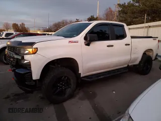 2020 Chevrolet Silverado 1500 Custom Trail Boss with VIN 1GCRYCEF2LZ252413, listed as a Copart auction lot 82679074 with 98,938 mi miles and Salvage Title. Bid and sale history available at DreamBid. Image 1.