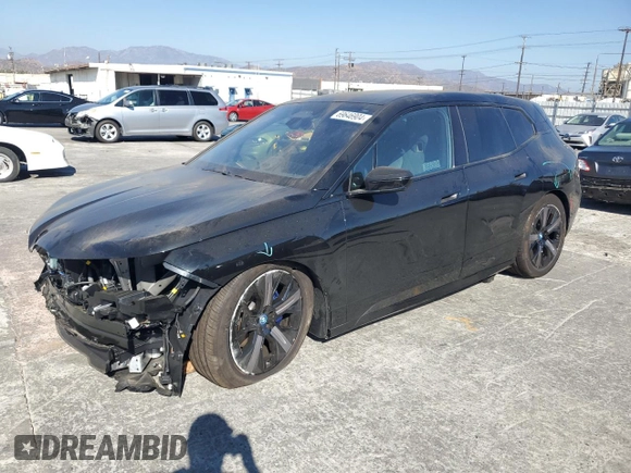2024 BMW iX M60 with VIN WB533CF01RCR28341, listed as a Copart auction lot 69646904 with 1,753 mi miles and Salvage Title. Bid and sale history available at carsss.com. Image 1.