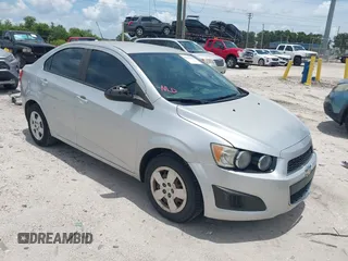 2015 Chevrolet Sonic LS with VIN 1G1JA5SH6F4135947, listed as a IAAI auction lot 42541162 with 153,597 mi miles and . Bid and sale history available at DreamBid. Image 1.