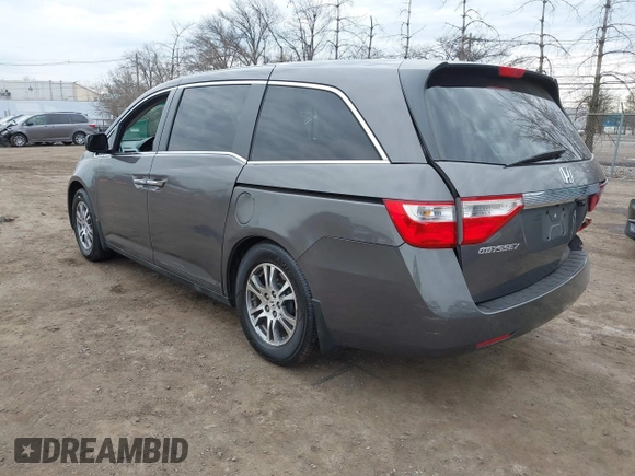 2012 Honda Odyssey EX-L with VIN 5FNRL5H65CB042898, listed as a IAAI auction lot 41784075 with 179,596 mi miles and . Bid and sale history available at carsss.com. Image 3.