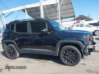 2017 Jeep Renegade Latitude with VIN ZACCJBBBXHPG58497, listed as a IAAI auction lot 41550493 with 137,360 mi miles. Bid and sale history available at carsss.com. Image 14.
