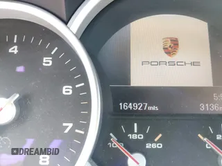 2005 Porsche Cayenne Turbo z VIN WP1AC29P25LA90019, wystawiony jako IAAI lot #42295764 z przebiegiem 164 927 mil mil oraz . Historia ofert i sprzedaży dostępna na DreamBid. Obrazek 15.