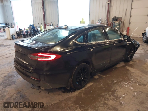 2019 Ford Fusion SE with VIN 3FA6P0HD3KR229021, listed as a IAAI auction lot 41576389 with 123,286 mi miles. Bid and sale history available at carsss.com. Image 4.