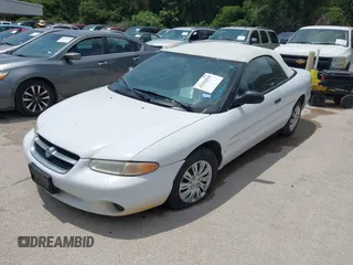 1997 Chrysler Sebring JX z VIN 3C3EL45H4VT624613, wystawiony jako IAAI lot #42262828 z przebiegiem Nie podano mil oraz . Historia ofert i sprzedaży dostępna na DreamBid. Obrazek 2.