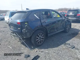 2018 Mazda CX-5 Grand Touring with VIN JM3KFBDM7J0343686, listed as a IAAI auction lot 41813638 with 74,084 mi miles. Bid and sale history available at carsss.com. Image 4.