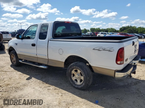 2004 Ford F-150 XL with VIN 2FTRX18W34CA64873, listed as a Copart auction lot 63946475 with 73,423 mi miles and Salvage title. Bid and sale history available at DreamBid. Image 2.