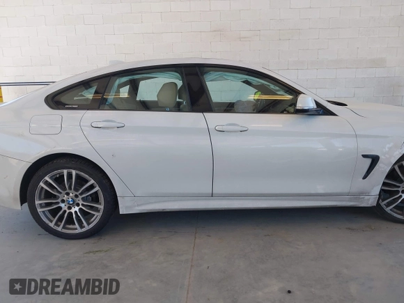 2015 BMW 4 Series 428i xDrive z VIN WBA4A7C55FD413965, wystawiony jako IAAI lot #42368615 z przebiegiem 108 308 mil mil oraz . Historia ofert i sprzedaży dostępna na DreamBid. Obrazek 13.